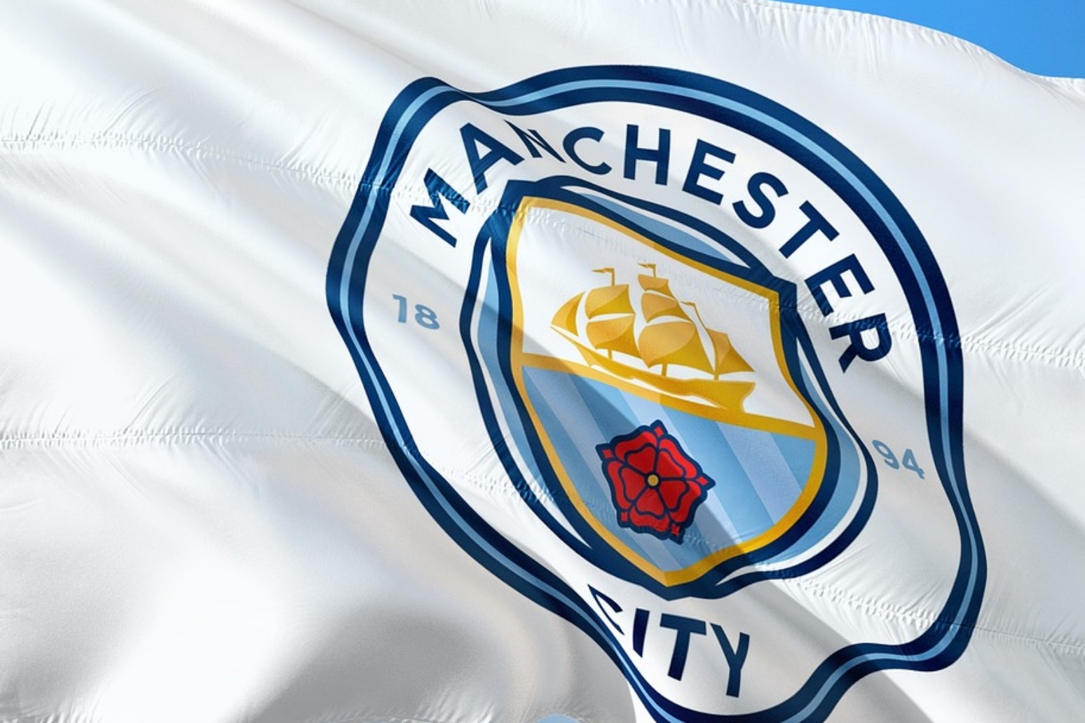 City keep the pressure on Liverpool at the top